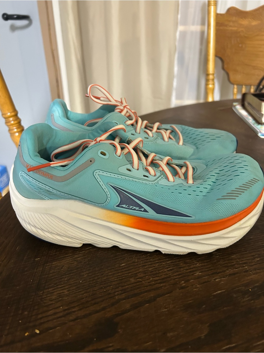Altra Women’s Aqua Turquoise Running Shoes with Orange Accents